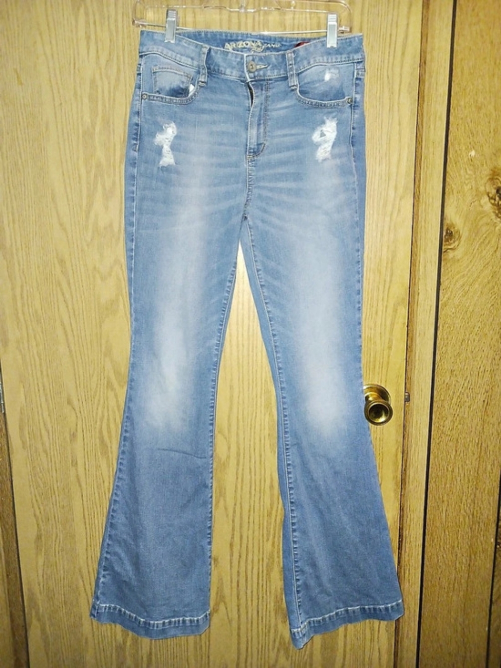Arizona Jean Co. Distressed Light Wash Flare Jeans. in Blue